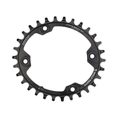 Plateau Mono Oval WOLF TOOTH ELLIPTICAL 96 BCD 11V Shimano XTR M9000/9020 4 Trous 96mm Noir — vue du plateau sur fond blanc