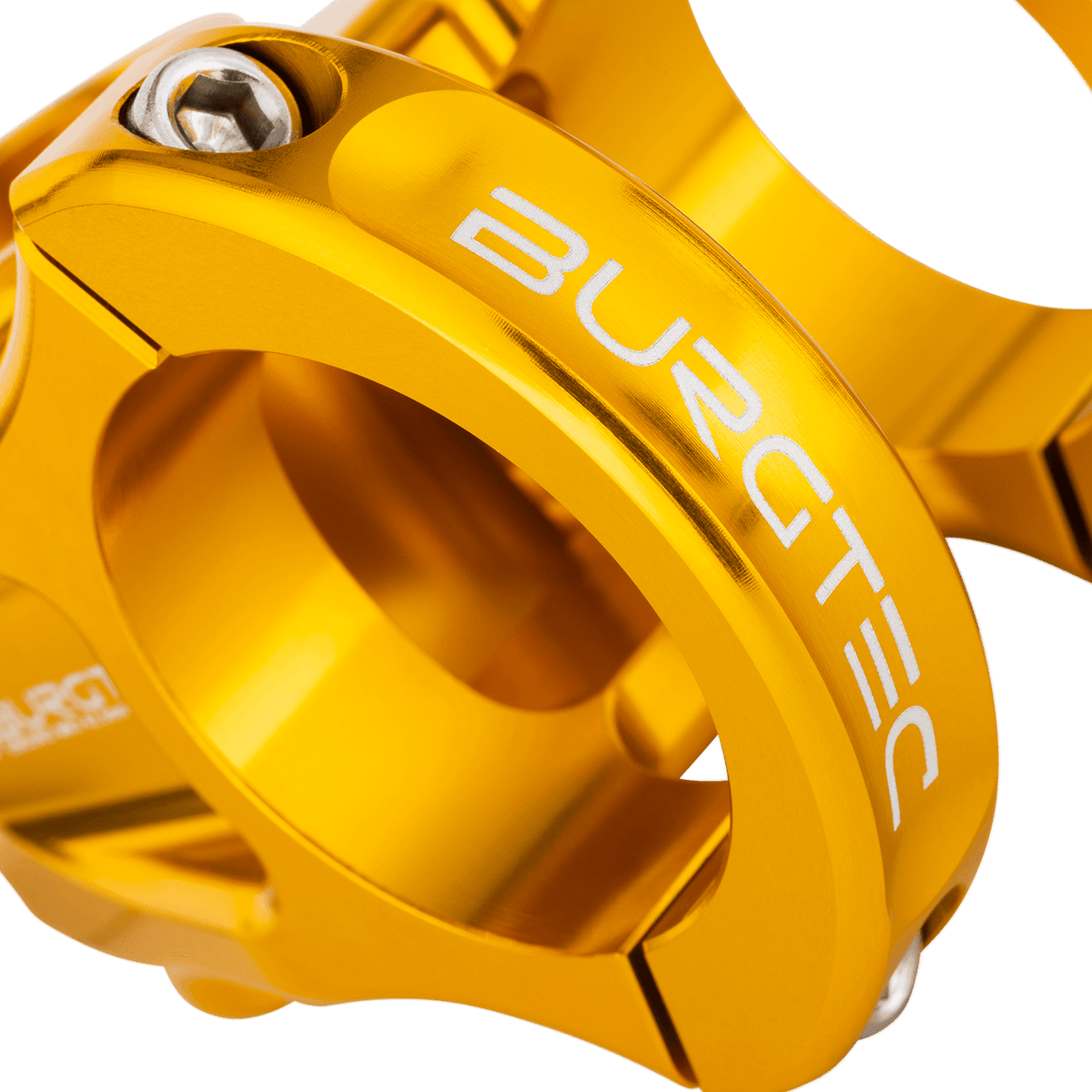 Potence BURGTEC ENDURO MK3 Or — détail du serrage du cintre